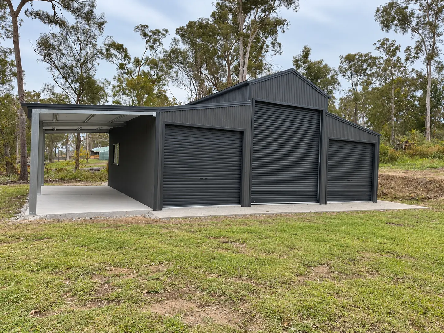 Front view of a custom farm shed with large roller door on a rural property